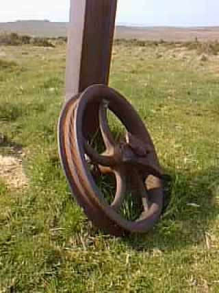 photo: wheel at foot of tower